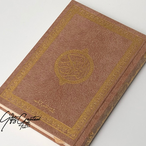 Velvet Quran with golden details on cover